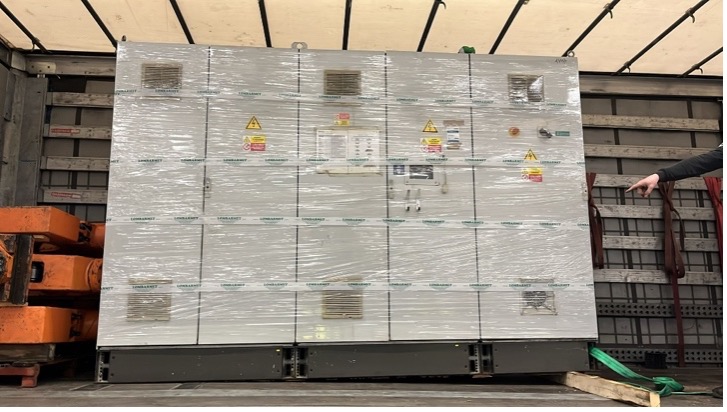 Large wrapped pallet stored in a warehouse