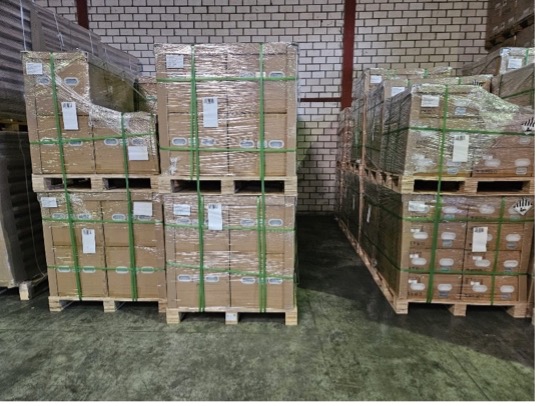 Strapped cartons on pallets in a warehouse
