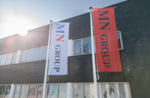 MN Group flags outside an office building