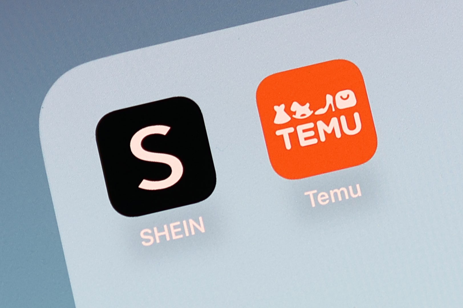 Shein and Temu mobile app logos